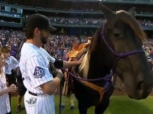 Colorado Rockies First Baseman Todd Helton and his family enthusiastically greet NXS A Tru Bustamove, Todd's retirement gift from the Rockies in honor of his 17 years with the organization. (Photo courtesy MLB.com)