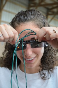 Student Tonya Colonna shows the sunglasses. Image courtesy of The Rose-Hulman Institute of Technology. Photo Credit: Chris Minnick.