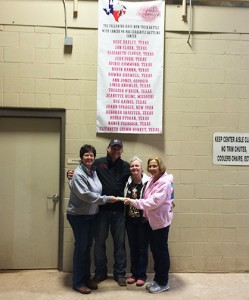 Renee & Eileen with Beverly from Careity in front of the banner listing cancer survivors or victims that are involved in with paint horses.