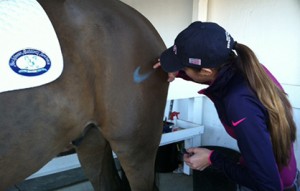 Ayden gives her horse Sjaoper a brand of his own. Photo courtesy of Ayden Uhlir.