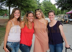 Kate Upton with her sister Laura and friends at a horse show in 2012. 