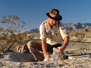 Eric Scott unearthing fossils. Image courtesy of San Bernadino County Museum.