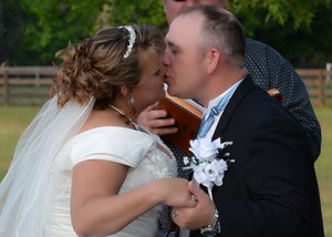 First kiss as a married couple. Photo Credit: Sarah Hall Photography