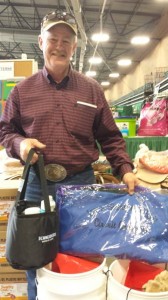 D Edminson showing off his Brandt Blanket sheet and Schneider's Ultra Tote with Grooming Products.