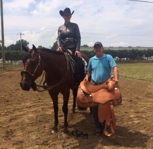 Random saddle winner, Melissa Baus and Getting Impulsive. Photo provided by Courtesy Promotions. 
