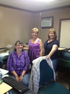 PQHA Office Staff Brenda Campbell, Show Manager Tammy Eichstadt, and Show Secretary Terri Clark ready for entries. 