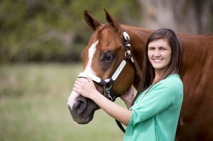 Recent graduate Andi Nelson and Mr. Verifiable. 