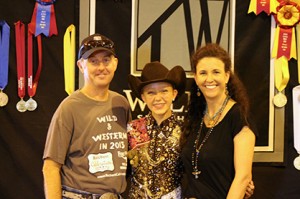 Caroline Nielson, her mother, and trainer Tim WIldes.