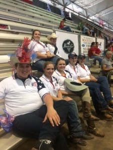 Team USA cheering on rider Grayson Stroud during the western riding class. Photo courtesy of Ali Fratessa.