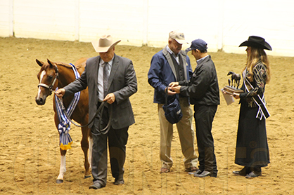 Dewey Smith Leads PF Thatsmschrometou to Win in Weanling Fillies at QH Congress