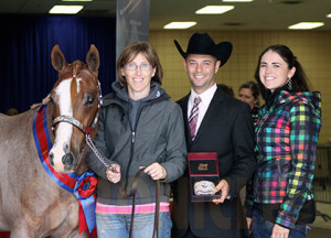 Kevin, Sandy McCook, James Saubolle, and Randi McCook are all smiles after his big win.