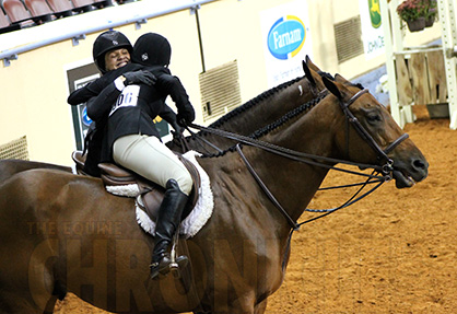 Sandoval, Henard, and Coutley Win Amateur Over Fence Classes at 2014 AQHA World Show