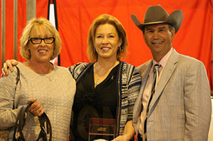 Breeder Cathi Robinson with Katie and JT Mitchell.