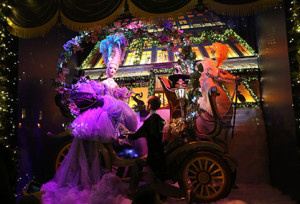 Cinderella arrives at the Saks Fifth Avenue Ball in a horse-drawn carriage. Photo courtesy of Saks Fifth Avenue. 
