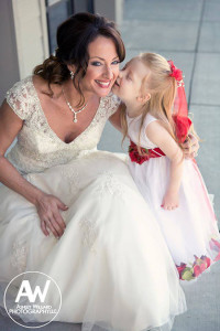 Monica Baker shares a kiss with her niece, Juniper Whitsell, before the wedding. 