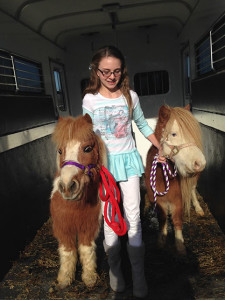 Brianna with two of her miniature horses. 