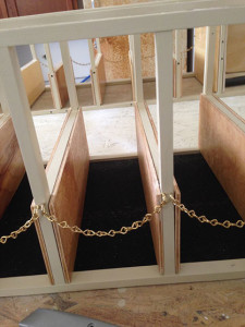 Tie stalls complete with rubber mats dn golden chains.