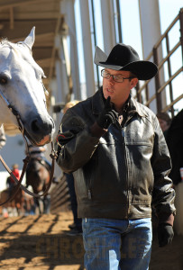 Trainer Adam Wainscott promising Huntin Big Dreams a slice of pizza if he performs well in the class...