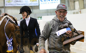 A very excited Brent Tincher following Olivia's win in 12-14 Hunter Under Saddle