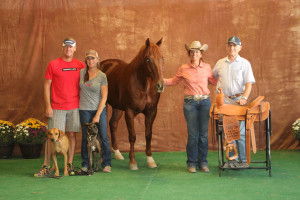 Natalie Baca and Doc Acres Reward win the Leson Saddle in the Combined High Score Non Pro Ranch Riding and Ranch Trail