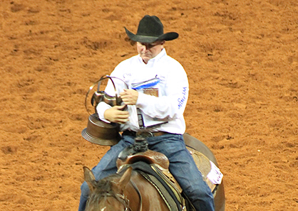 George Strait’s DT Elenor Shine Whiz Wins Silver and Bronze at AQHA World in Jr. Heeling and Heading With JD Yates