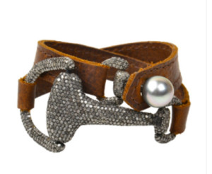 Montana Bracelet full pave sterling silver snaffle bits, 7.42 carats of diamonds, tahitian pearl, premium leather, can be worn as a choker or bracelet. Image courtesy of Vincent Peach Equestrian Collection. 
