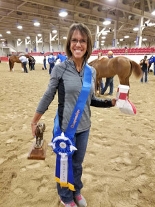 Deanna Searles showing off the EMO Western States Championship Trophy and Neck Ribbon – congratulations!