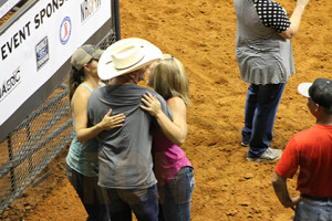 Katie and Rusty Green and Shannon Curl share a congratulatory hug as the results are announced. 