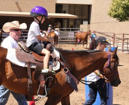 1,560 Attend National Day of the Cowboy, Many Ride a Quarter Horse For the First Time!