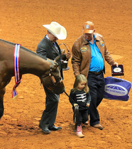 Vern Habighorst, Ross Roark, and Scarlet Engle with Henry.