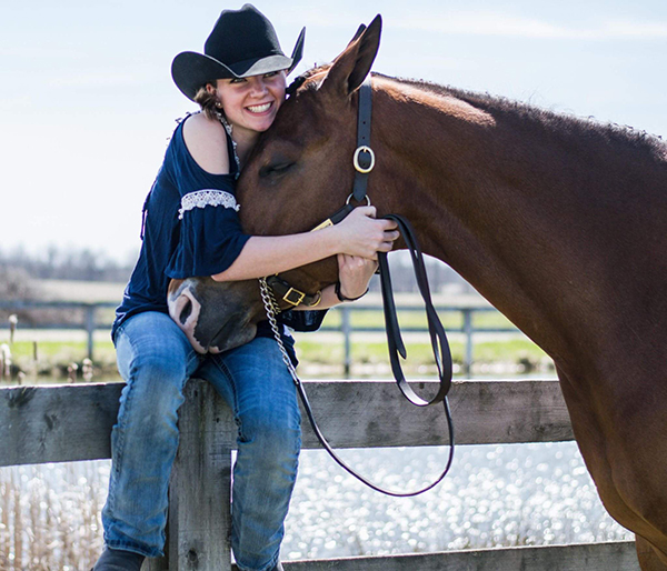 EC Photo of the Day: Give Your Horse A Hug!