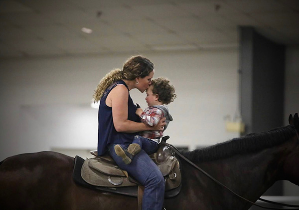 EC Photo of the Day- Multi-Tasking Momma