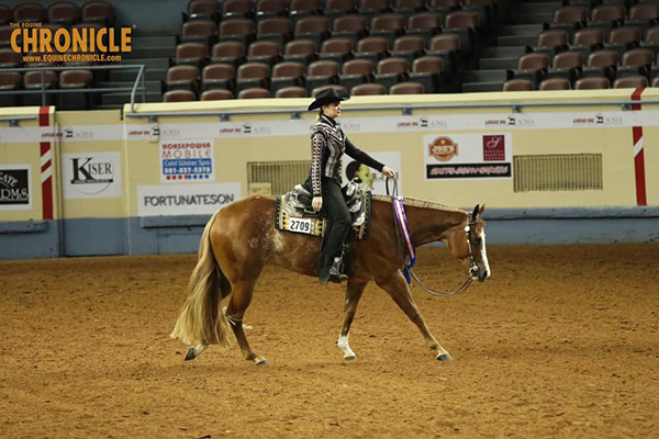 Sara Simons and Hez Blazin Trouble Win AQHA World Junior Western Riding