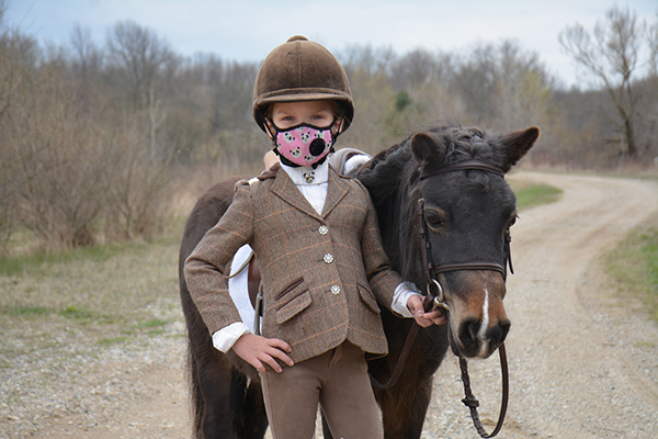 Wearing a Mask isn’t Anything New For This 6-Year-Old Equestrian