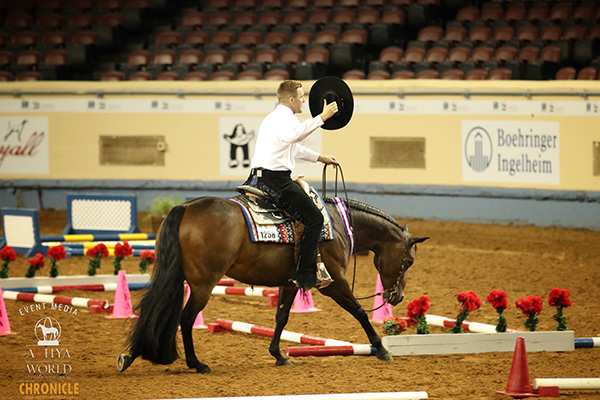 Grant Mastin and Hand Made Machine Win 14-18 Trail at AQHA Youth World