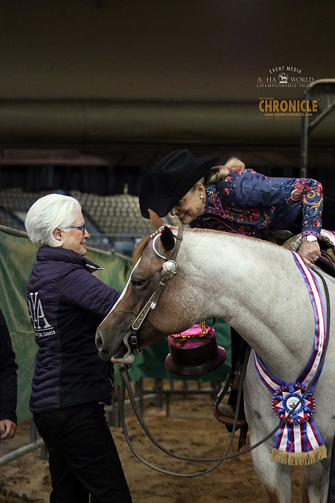 Susie Johns wins a Gold Globe with KM Flat Out the Best at 2022 AQHA World