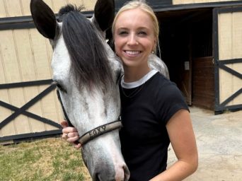 Emma Edwards Purchases The Town Bluezy from Nettie Olsen