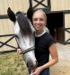 Emma Edwards Purchases The Town Bluezy from Nettie Olsen