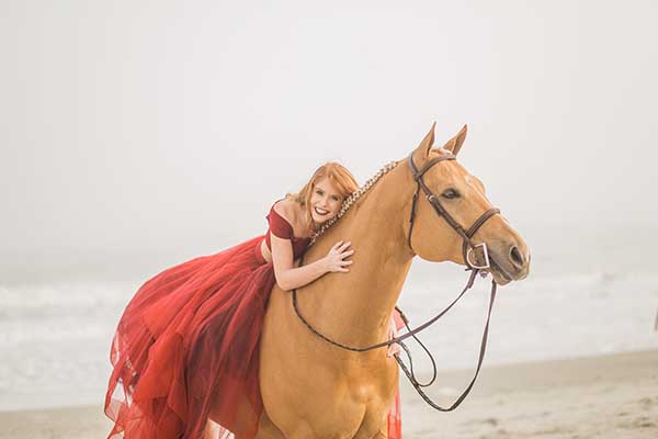 EC Photo of the Day: Red Horse, Red Hair, Red Dress