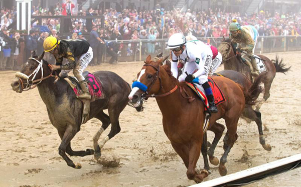 Justify Continues Triple Crown Bid With Rainy Day Preakness Win