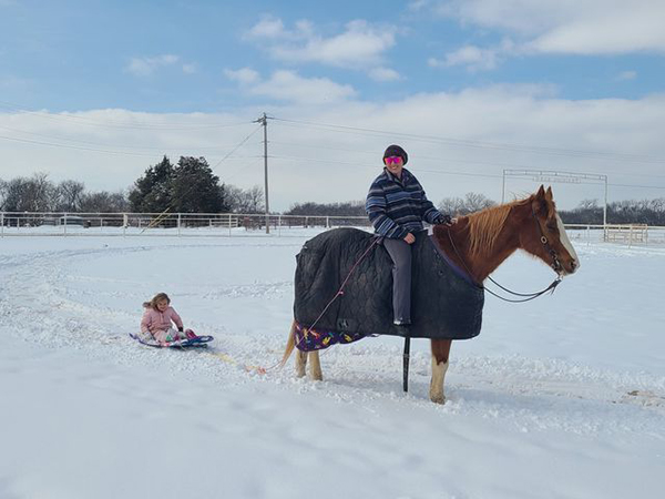 EC Photo of the Day- Snow Day Sled Ride